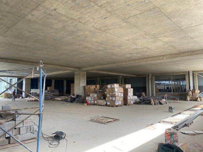 Usine de textile, dalle post-tensionnée 900 m²